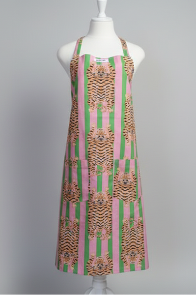 Apron with tiger and stripe pattern on a mannequin against a white background