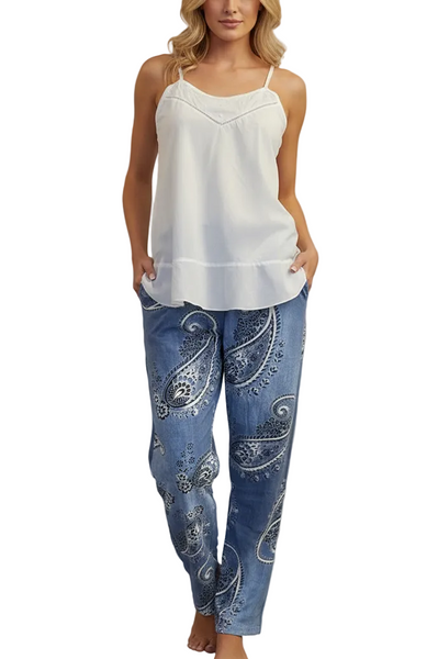 White top and blue jeans with paisley patterns on a gray background