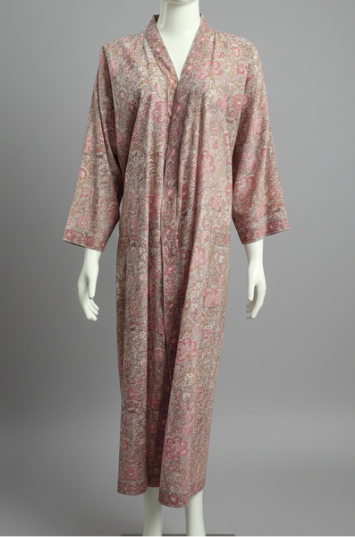 A patterned pink robe against a gray background