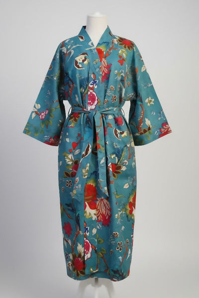 Floral patterned robe on a mannequin against a white background